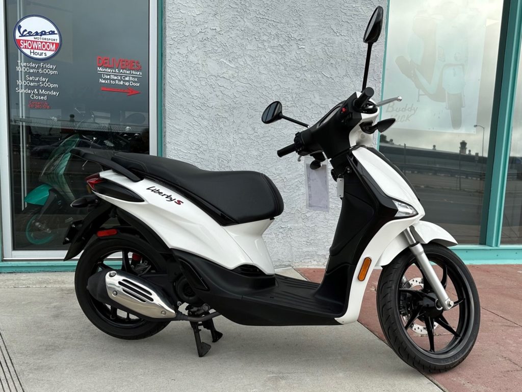 Pre owned online scooty